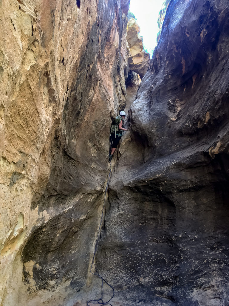 Rappelling in Cassidy Arch Canyon