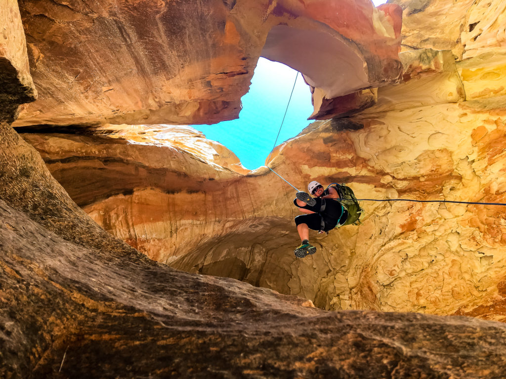 Rappelling in Cassidy Arch Canyon